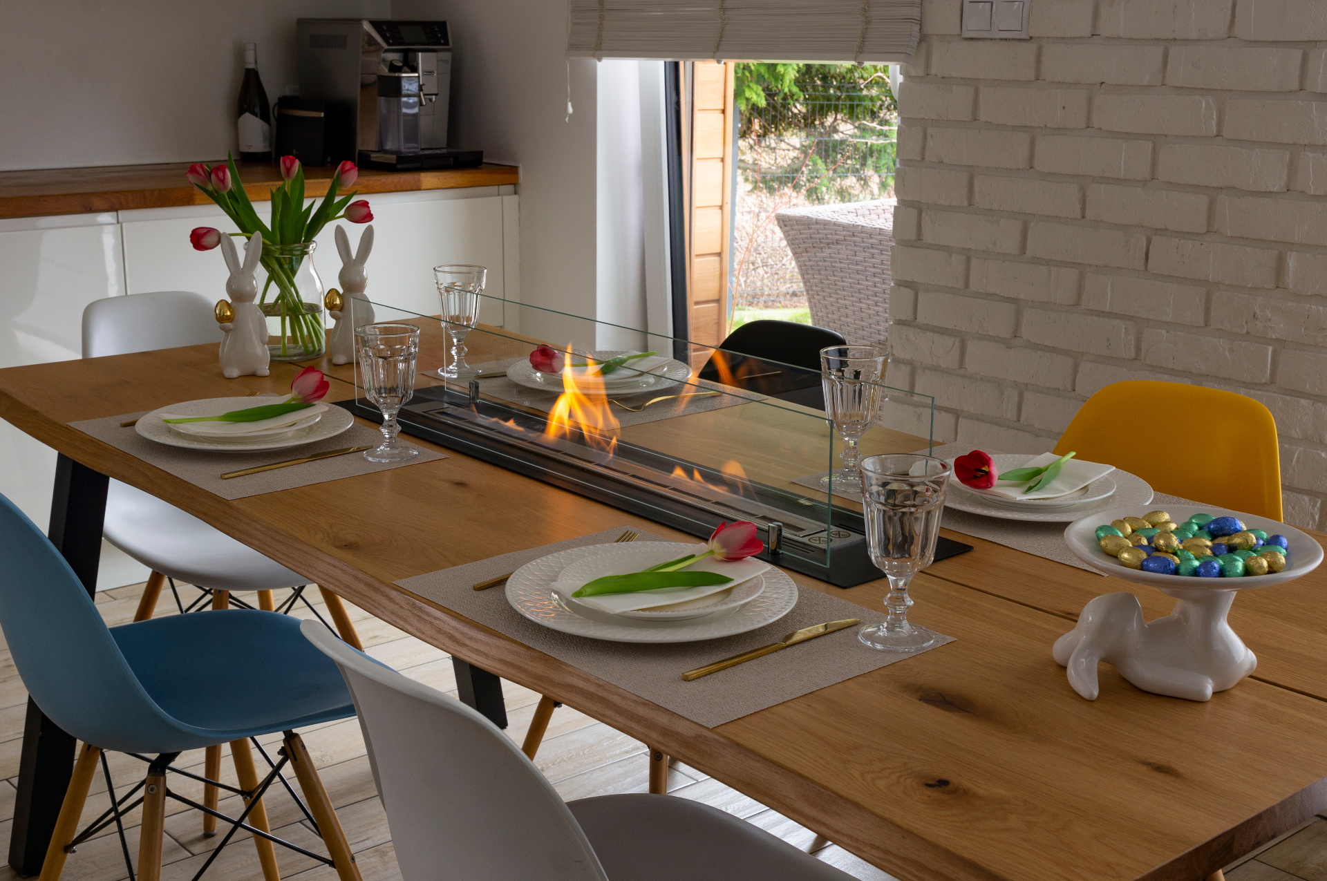 A Pure Fire tabletop bioethanol fireplace bringing a dining table to life